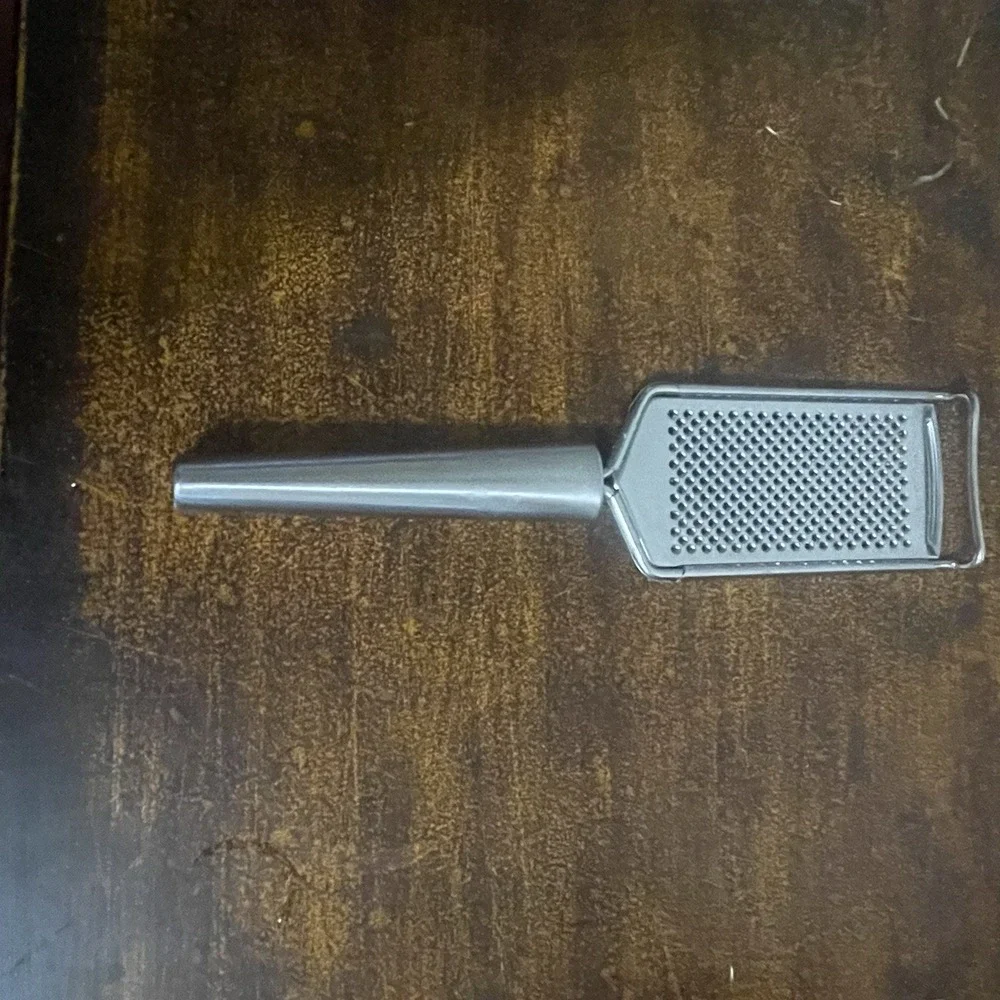 Oneida Stainless Steel Hand Grater/ Zester with Hand Grip and Pot Hook.